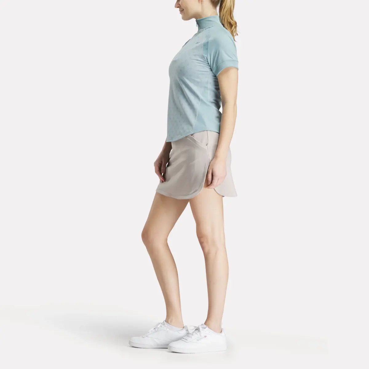 Women’s Short Sleeve 1/4 Zip Mini Argyle Print Top Women’s Short Sleeve 1/4 Zip Mini Argyle Print Top